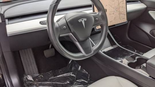 2018 Tesla Model 3 5YJ3E1EAXJF166602