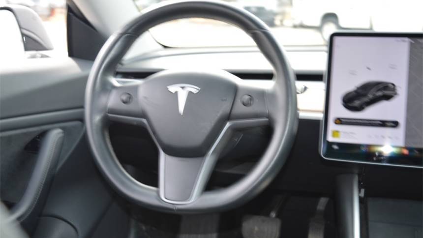 2018 Tesla Model 3 5YJ3E1EB8JF084649