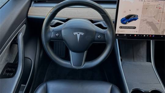 2018 Tesla Model 3 5YJ3E1EA7JF038057