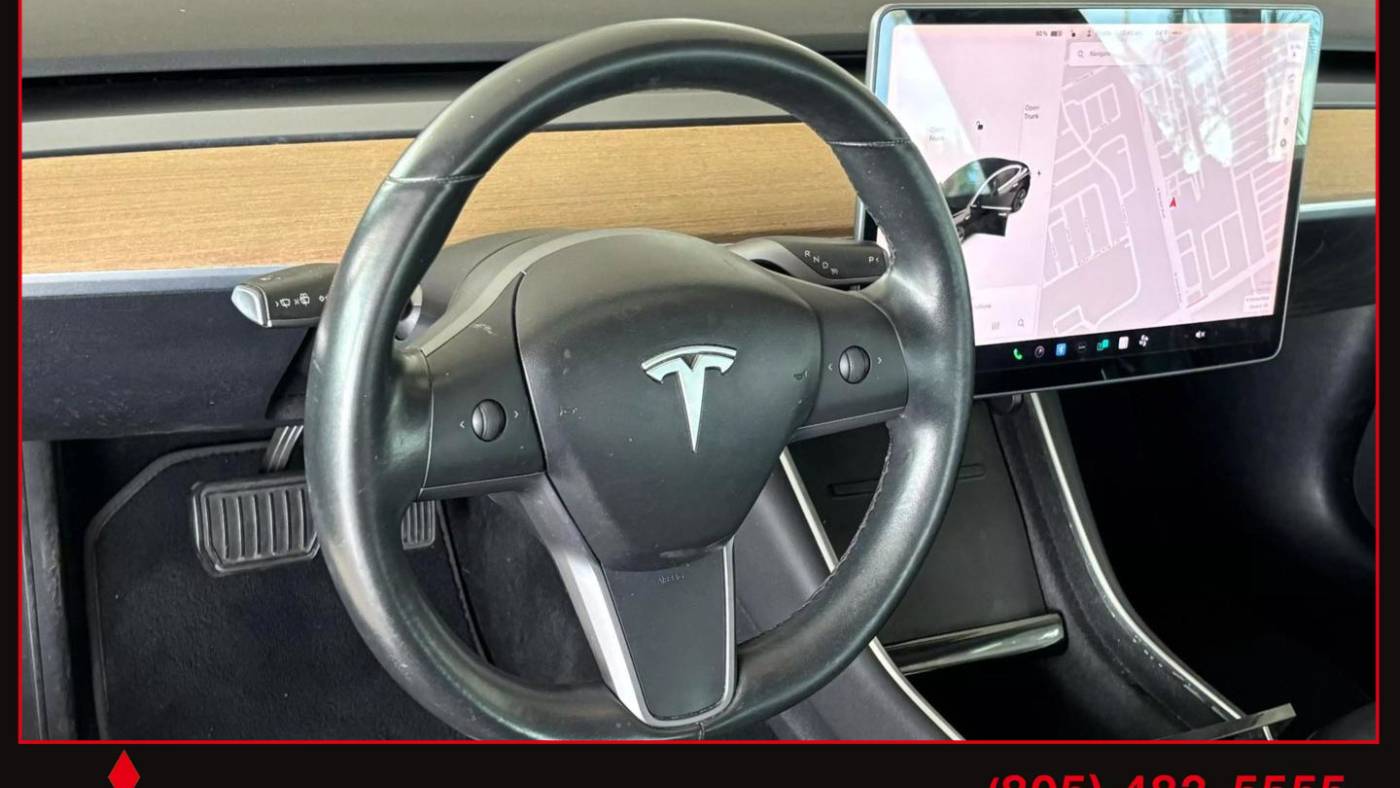 2018 Tesla Model 3 5YJ3E1EAXJF173338