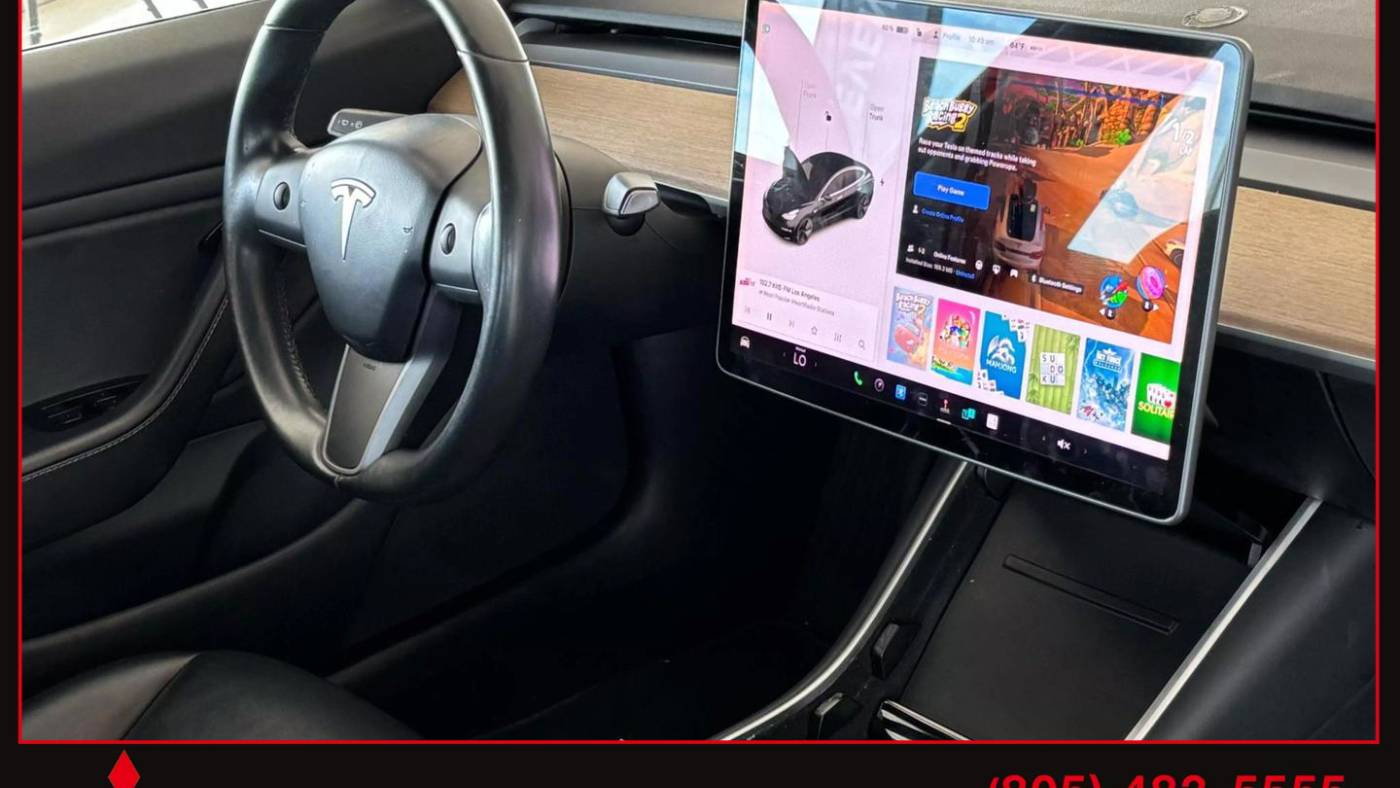 2018 Tesla Model 3 5YJ3E1EAXJF173338