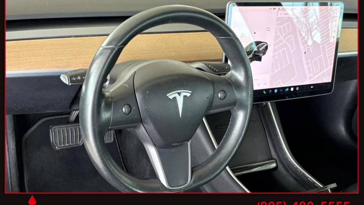 2018 Tesla Model 3 5YJ3E1EAXJF173338