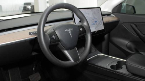 2021 Tesla Model Y 5YJYGDED4MF124202